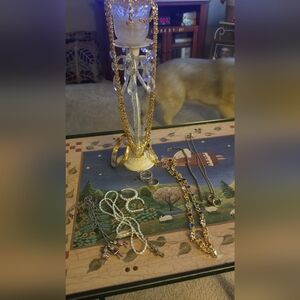 Bundle total 11 pieces costume jewelry. The silver ring is about a size 10,